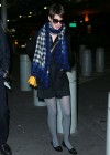 Anne Hathaway wearing glasses at JFK Airport in NYC